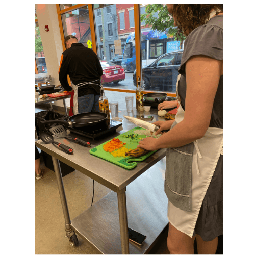 Cooking in a cooking class